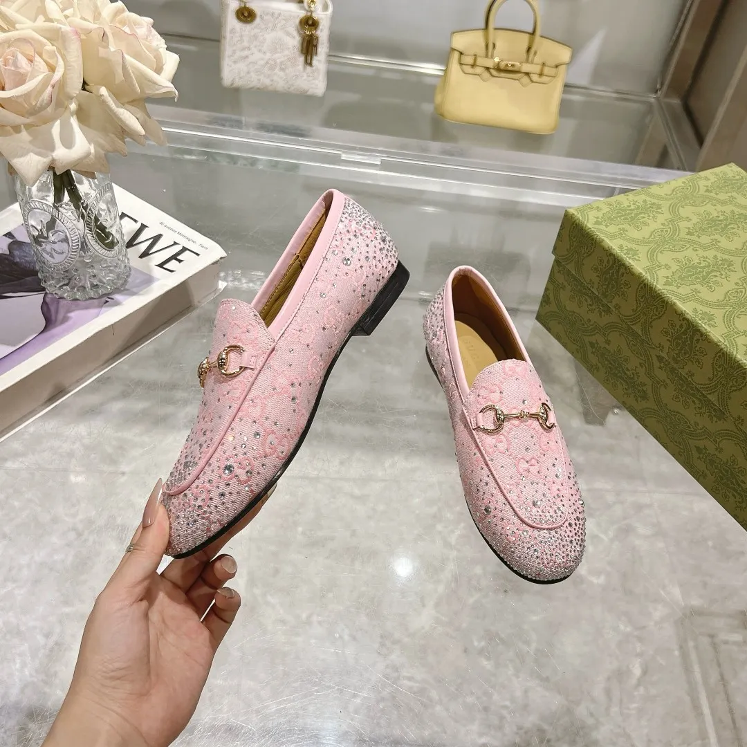 👟👟Ex-factory price 500👟👟 Genuine leather sole +50 (35-41) (41/42 customized) As an outstanding representative of Gucci’s design heritage, the Jordaan series of loafers with horsebit buckles vividly highlight the classic and elegant style. Crafted from the brand's signature monogram canvas, this shoe is timeless. Made from soft material and with a refined, smooth silhouette, these shoes are a perfect expression of everyday elegance. Gucci Angora Red GG Canvas Women Light Gold Tone Hardware Horsebit Faceted Crystal Detail Leather Sole Flat.